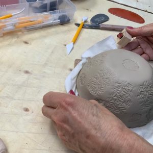 Surface decoration using specialist pottery stamps